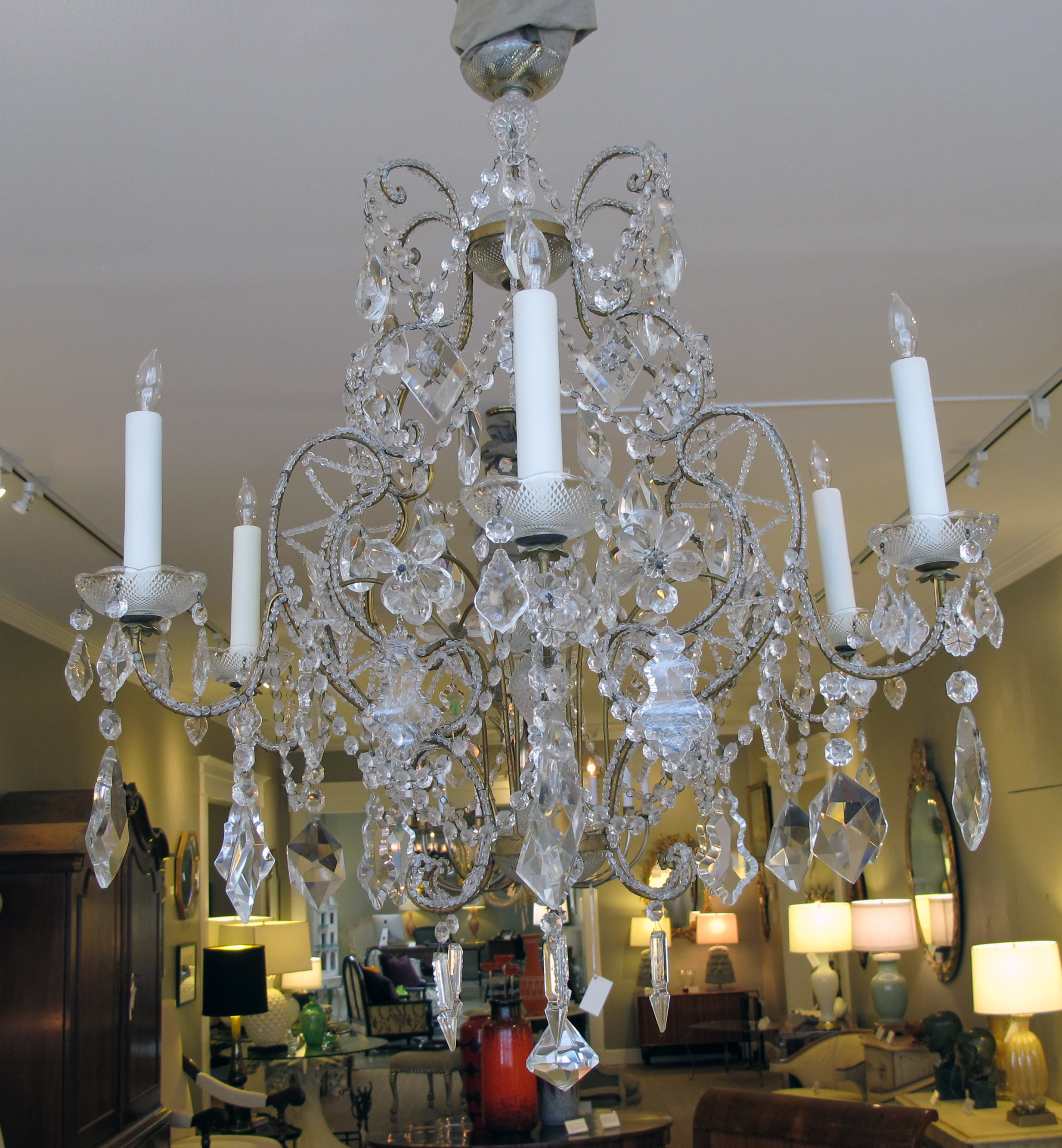 a lustrous and graceful italian rococo style cage-form beaded 6-light  chandelier with crystal pendants, flowers and swags epoca antiques & 20th  century furnishings san francisco