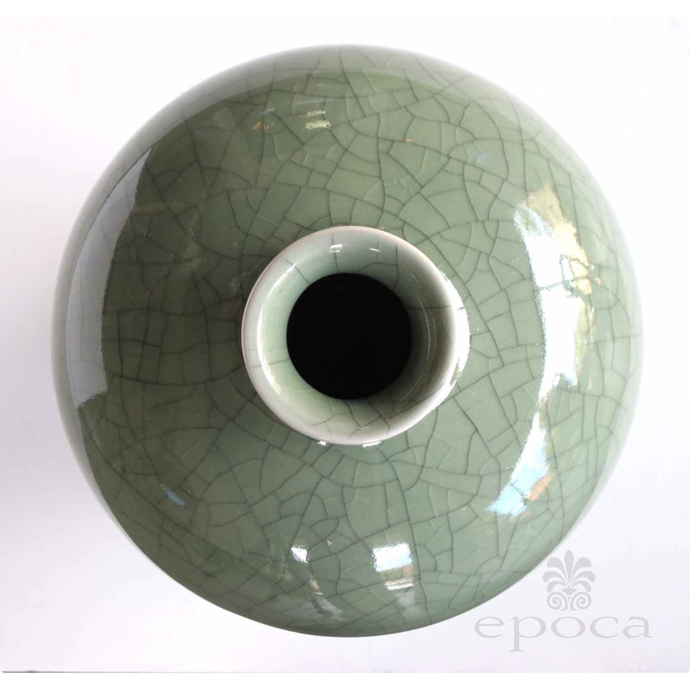 an elegantly-shaped chinese celadon crackle-glazed mei ping (plum) vase ...